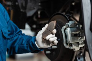What could be the reasons for squeaking brake pads?