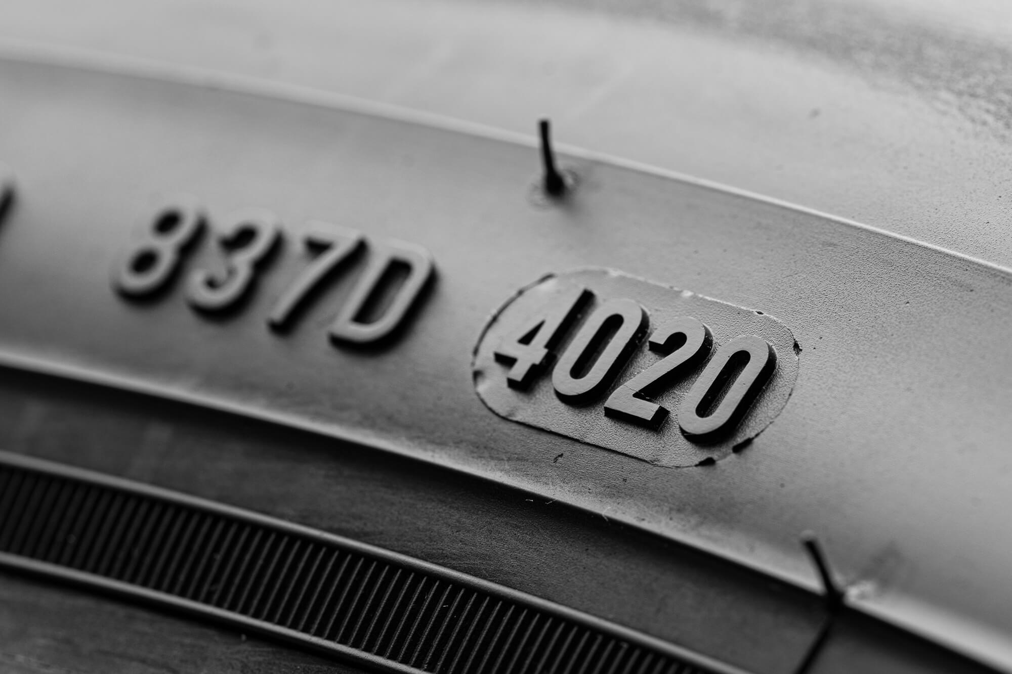 How do you check a tyre’s date of manufacture (DOT) and what does it mean?